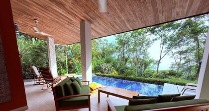 Charming 4-bedroom house with AC, WiFi in beautiful Uvita w/ whale's tail view