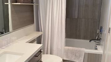Hair dryer, towels, soap, toilet paper