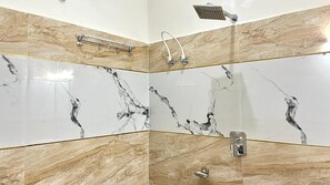 Shower, free toiletries, slippers, towels