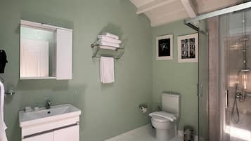 Comfort Room | Bathroom | Free toiletries, hair dryer, slippers, towels