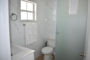 Hair dryer, towels, soap, toilet paper