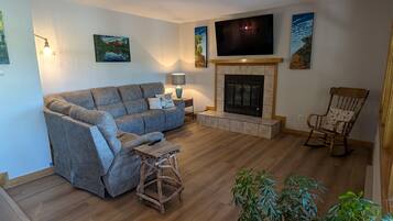 Smart TV, fireplace, books