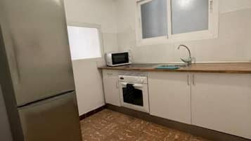 Een magnetron, een oven, een kookplaat