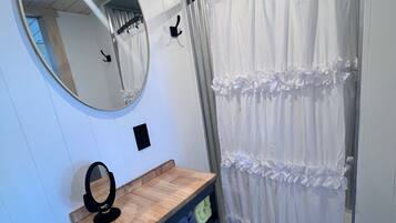 Shower, towels, soap, toilet paper