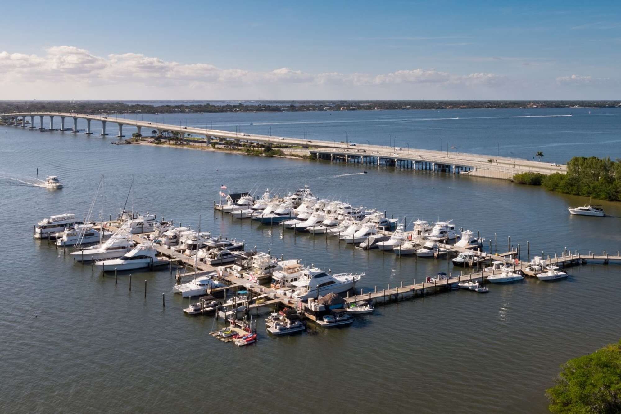 Private Marina View: 75-slip marina docking boats along waterway