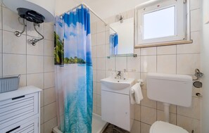 Dusj og hårføner