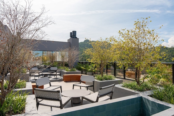 Apartamento Grand | Restaurante al aire libre