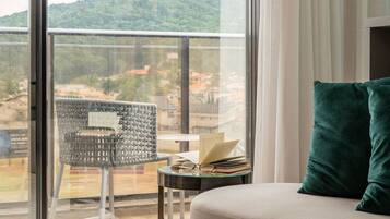 Elite Apartment | Living area | 40-inch Smart TV with digital channels