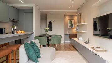 Premium Apartment | Living area | 40-inch Smart TV with digital channels