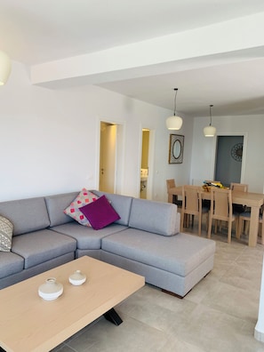Superior Apartment, Sea View | Living area | 100-cm Smart TV with digital channels - Seaview & Jacuzzi (Mykonos)