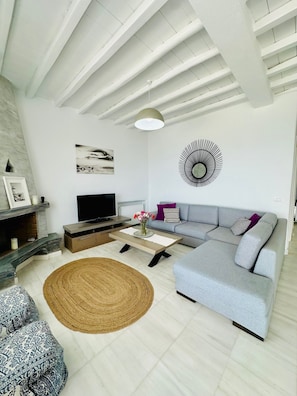 Luxury Apartment, Sea View | Living area | Flat-screen TV