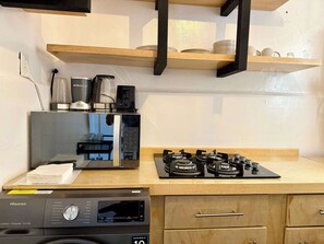 Fridge, microwave, stovetop, coffee/tea maker