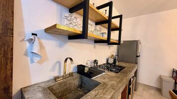 Fridge, microwave, stovetop, coffee/tea maker