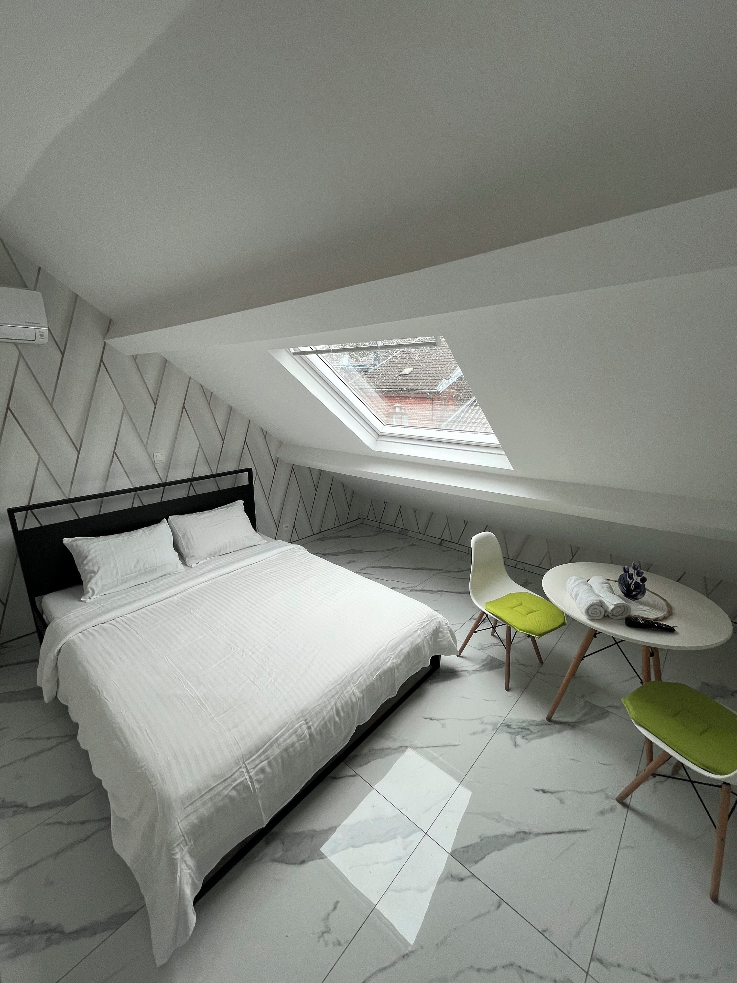 La chambre du studio au dernier étage