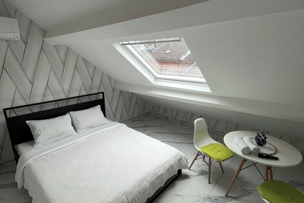 La chambre du studio au dernier étage
