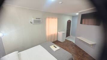 Suíte executiva | 1 quarto, espaço de trabalho para notebook, Wi-Fi de cortesia