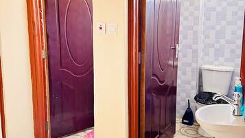 Shower, towels, soap, toilet paper