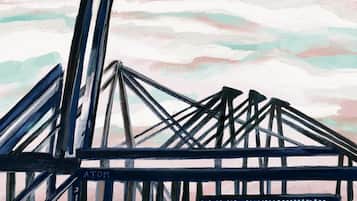 A painting of a bridge with a sign that reads "ATOM".