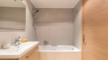 Hair dryer, towels, soap, toilet paper