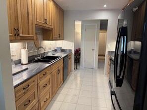 Fridge, microwave, oven, stovetop - Charming 3-bedroom farmhouse on 5 acres with in enchanting Englewood, FL. (Englewood)