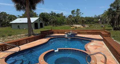 Charming 3-bedroom farmhouse on 5 acres with in enchanting Englewood, FL.