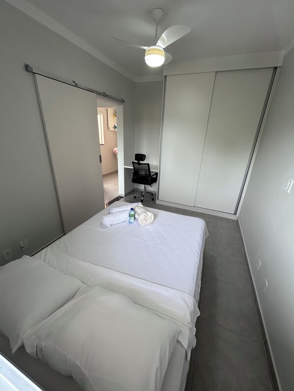 1 bedroom, desk, iron/ironing board, bed sheets