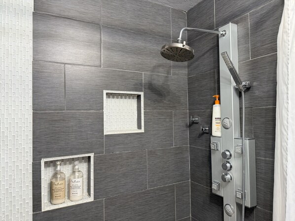 Shower, hair dryer, towels, soap