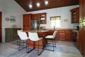 Microwave, oven, stovetop - Sunset Villas 4A: Seaside Serenity 2-Bedroom Condo (West End)