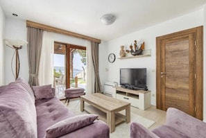 Deluxe-Villa, Balkon, Meerblick | Wohnbereich