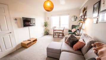 Classic Apartment | Living area | 1-inch TV with digital channels