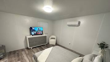1 dormitorio, tabla de planchar con plancha, wifi gratis y ropa de cama