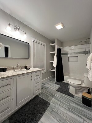 Hair dryer, towels, soap, shampoo