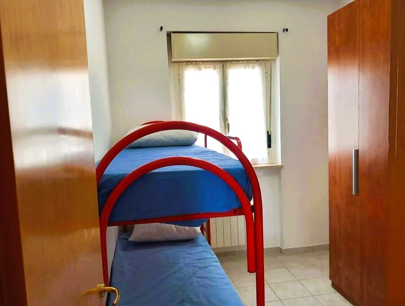 2 slaapkamers, een strijkplank/strijkijzer, gratis wifi, beddengoed