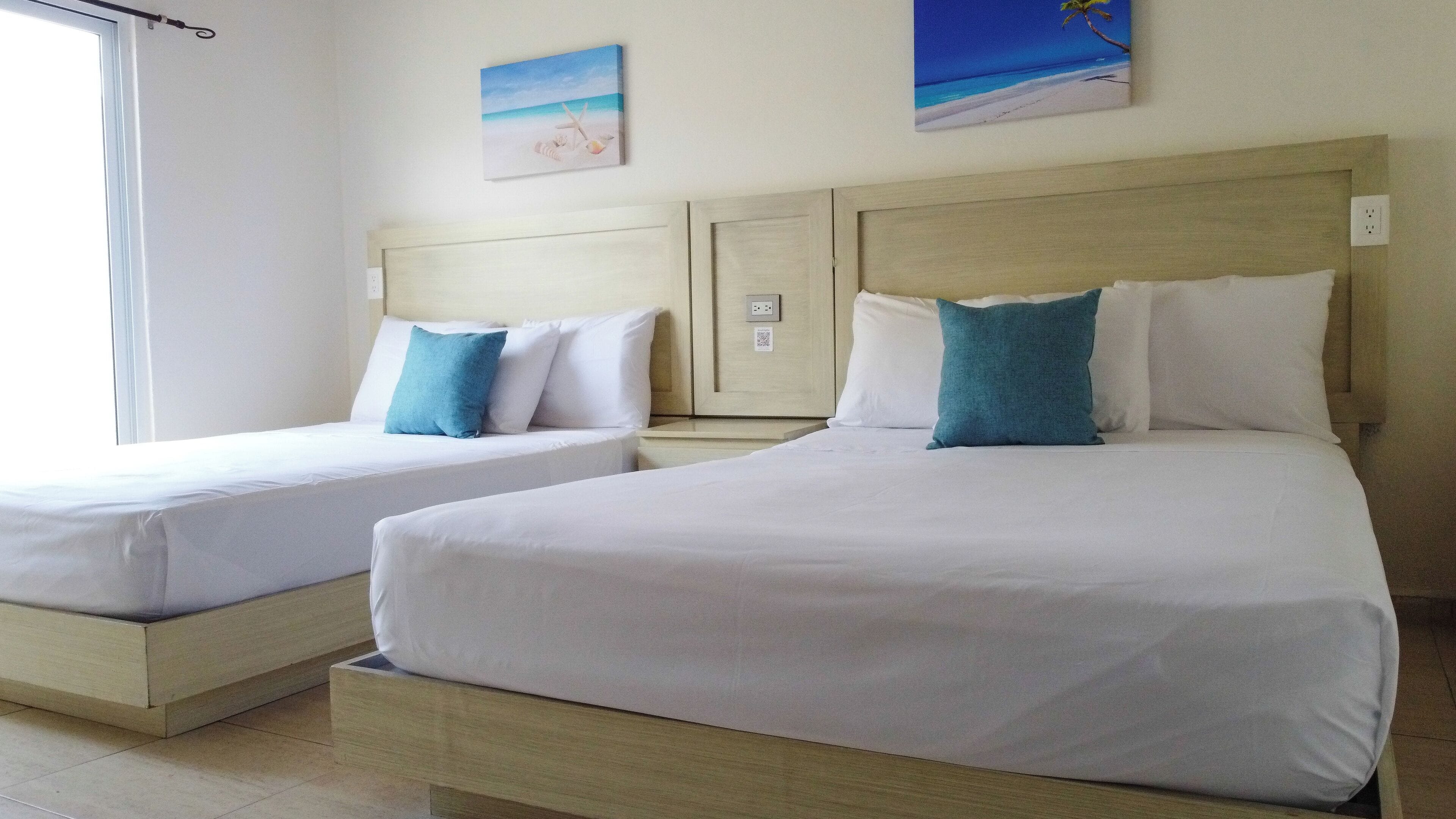 Deluxe Quadruple Room | Free WiFi, bed sheets
