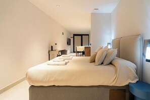 Iron/ironing board, travel crib, free WiFi, bed sheets