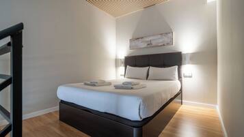 Iron/ironing board, travel crib, free WiFi, bed sheets