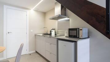 Fridge, microwave, coffee/tea maker, toaster