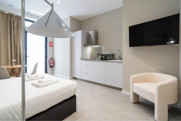 Iron/ironing board, travel crib, free WiFi, bed sheets