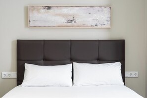 Iron/ironing board, travel crib, free WiFi, bed sheets