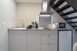 Fridge, microwave, coffee/tea maker, toaster