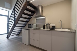 Fridge, microwave, coffee/tea maker, toaster