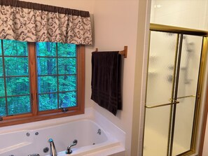 Jetted bath, hair dryer, towels, soap