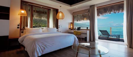 Luxury Bungalow, Lagoon View | Premium bedding, minibar, in-room safe, desk