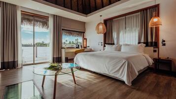 Luxury Bungalow, Lagoon View | Premium bedding, minibar, in-room safe, desk
