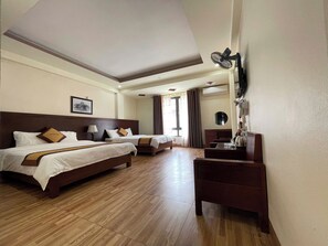 Deluxe Quadruple Room, Mountain View | Desk, laptop workspace, blackout drapes, soundproofing - Sapa Tulip Hotel (Sa Pa)
