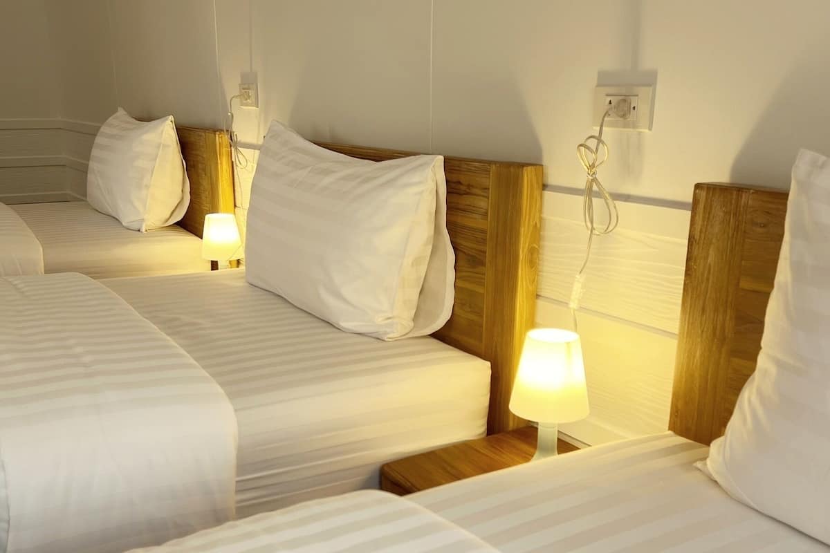 Deluxe Triple Room | Free minibar, desk, laptop workspace, blackout drapes