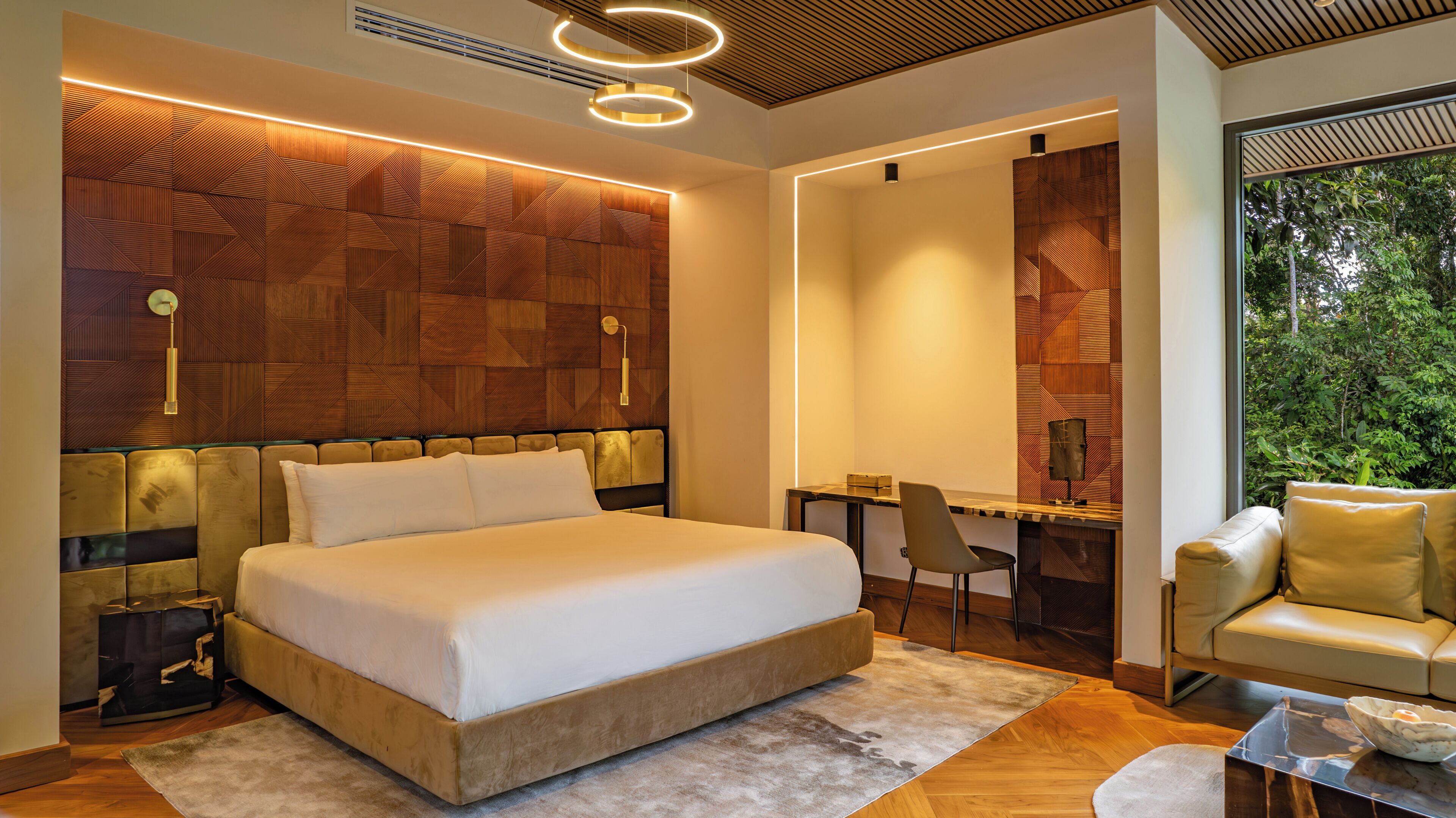 Deluxe Room, River View | Minibar, in-room safe, desk, laptop workspace