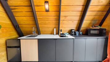 Fridge, microwave, stovetop, coffee/tea maker