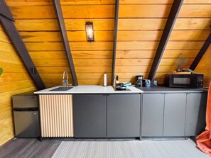 Fridge, microwave, stovetop, coffee/tea maker