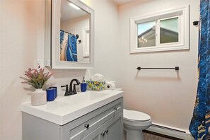 Hair dryer, towels, soap, toilet paper
